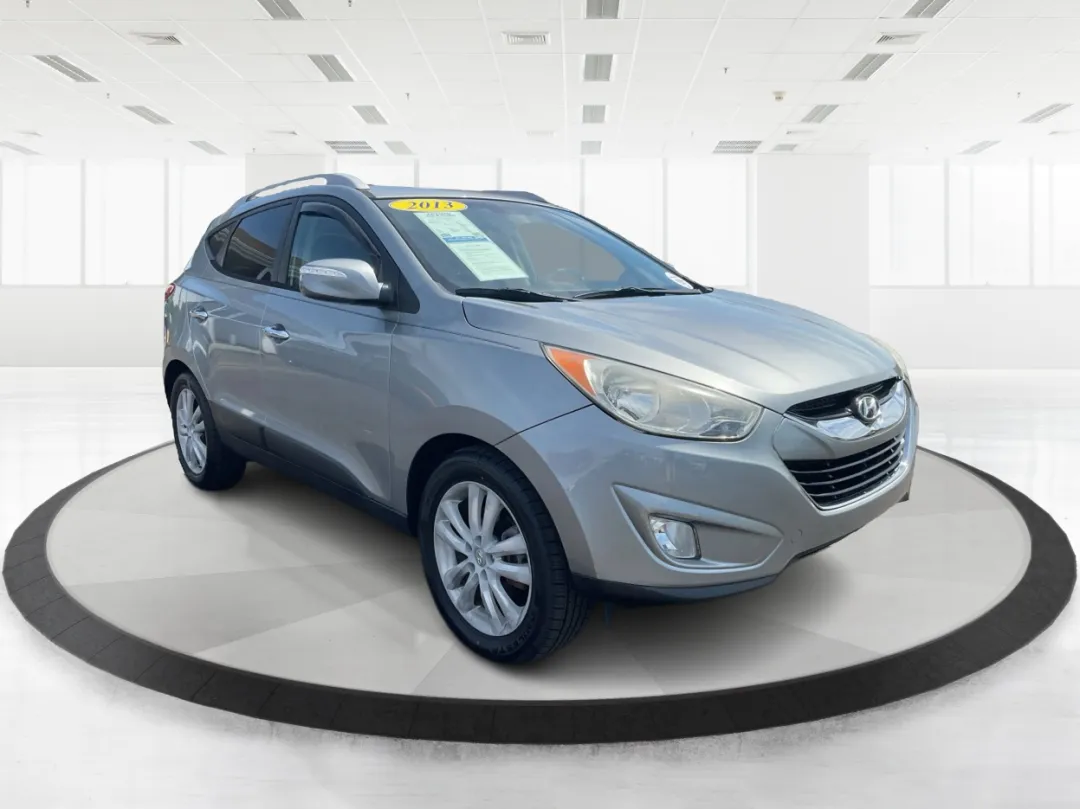 2013 Hyundai Tucson - KM8JUCAC4DU709690 - Image #1