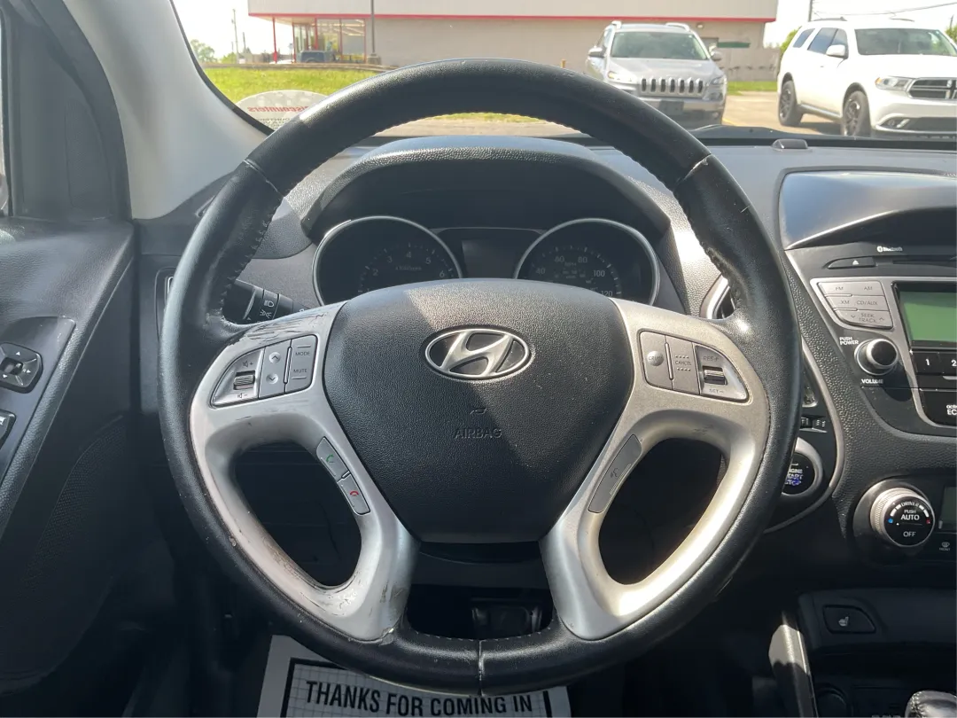 2013 Hyundai Tucson - KM8JUCAC4DU709690 - Image #16
