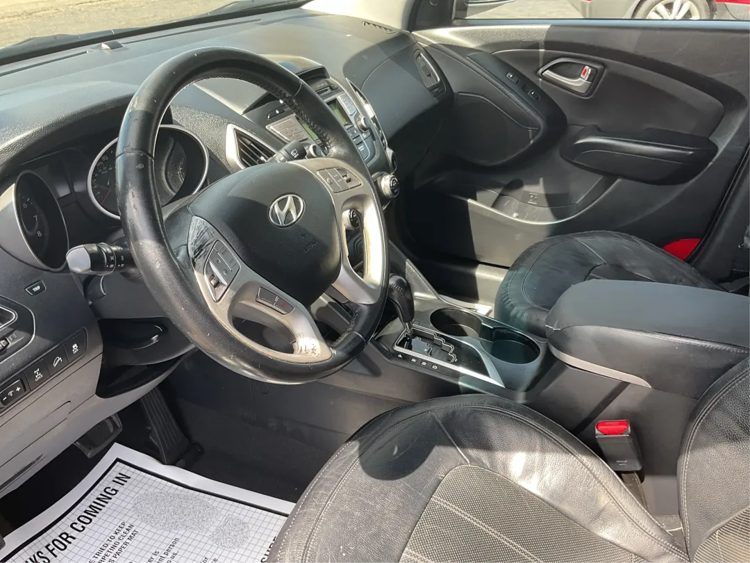 2013 Hyundai Tucson - KM8JUCAC4DU709690 - Image #9